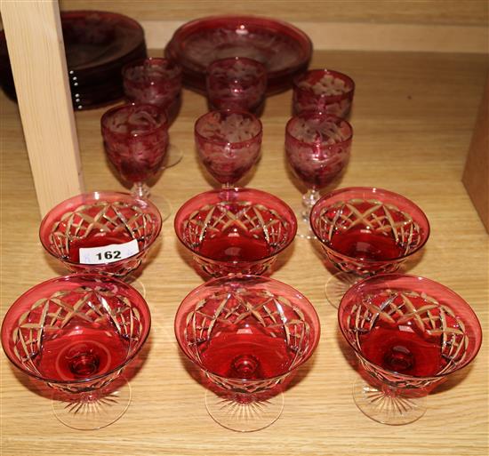 A set of six ruby overlaid vineous cut glasses, six dessert dishes and a group of assorted plates